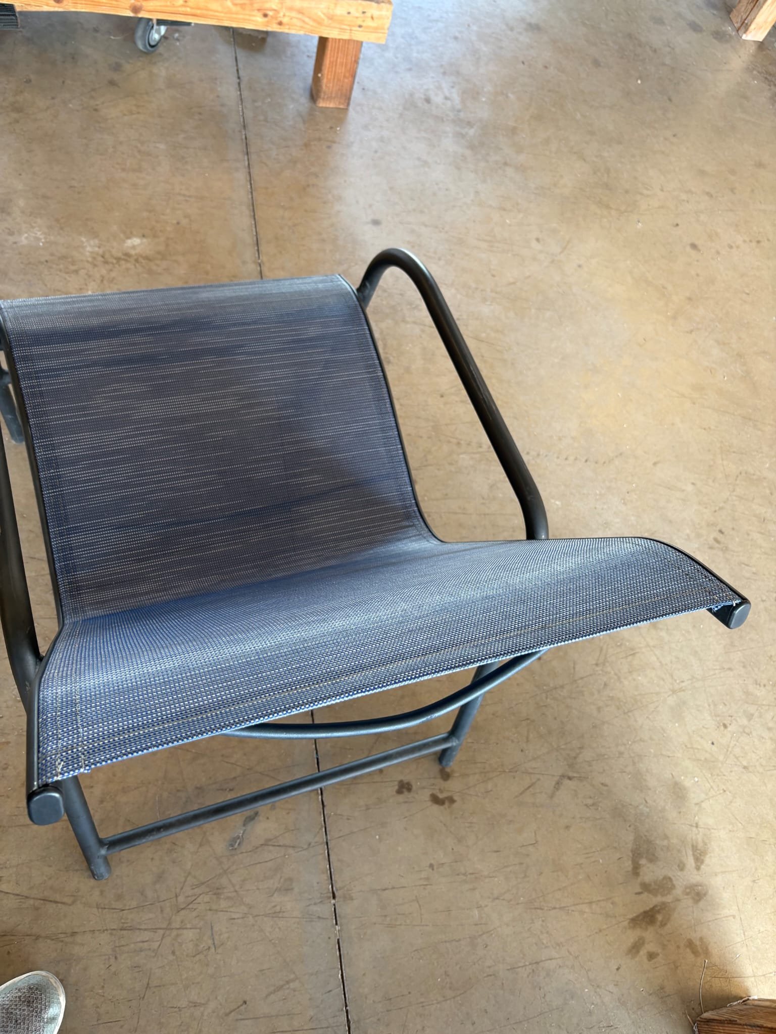 WhatsApp Image 2026-08-20 at 14.40.13 (1) Restored navy outdoor sling chair after restoration