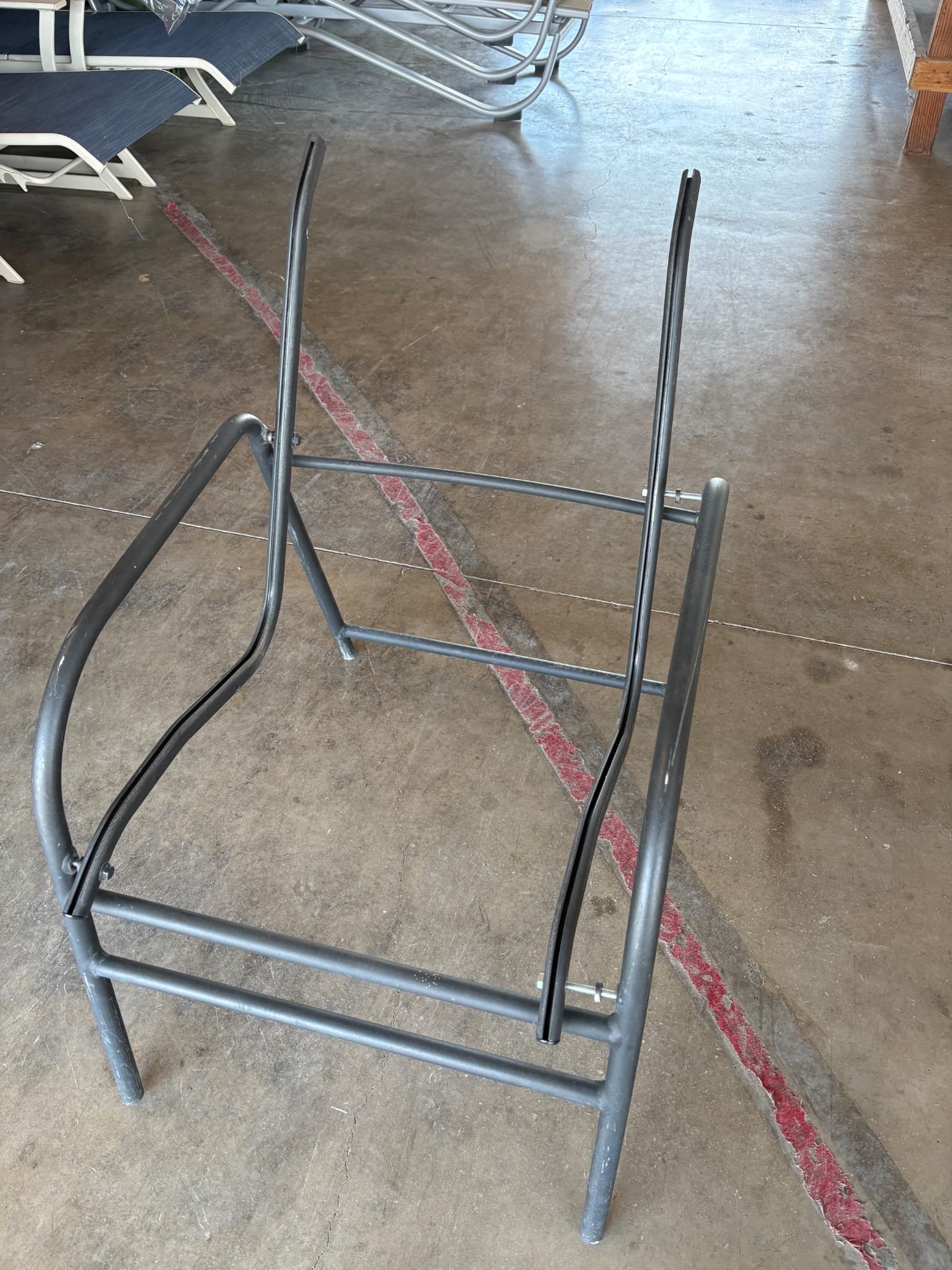 Outdoor chair frame prepared for new sling fabric